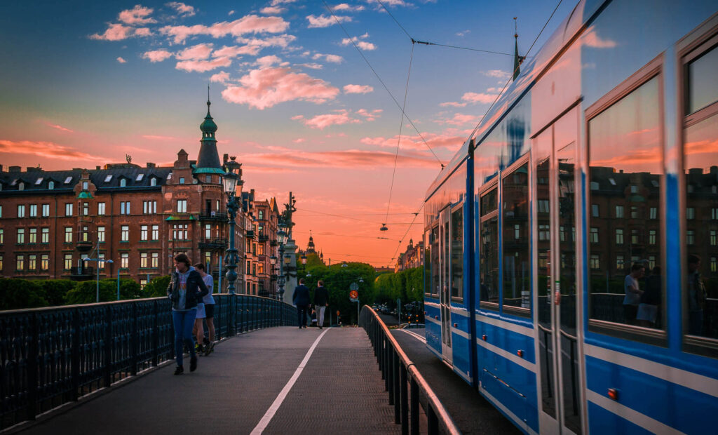 Djurgårdsbron, tram and a pink sunset